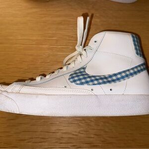 Nike White High-Top Sneakers with Blue Checkered Swoosh